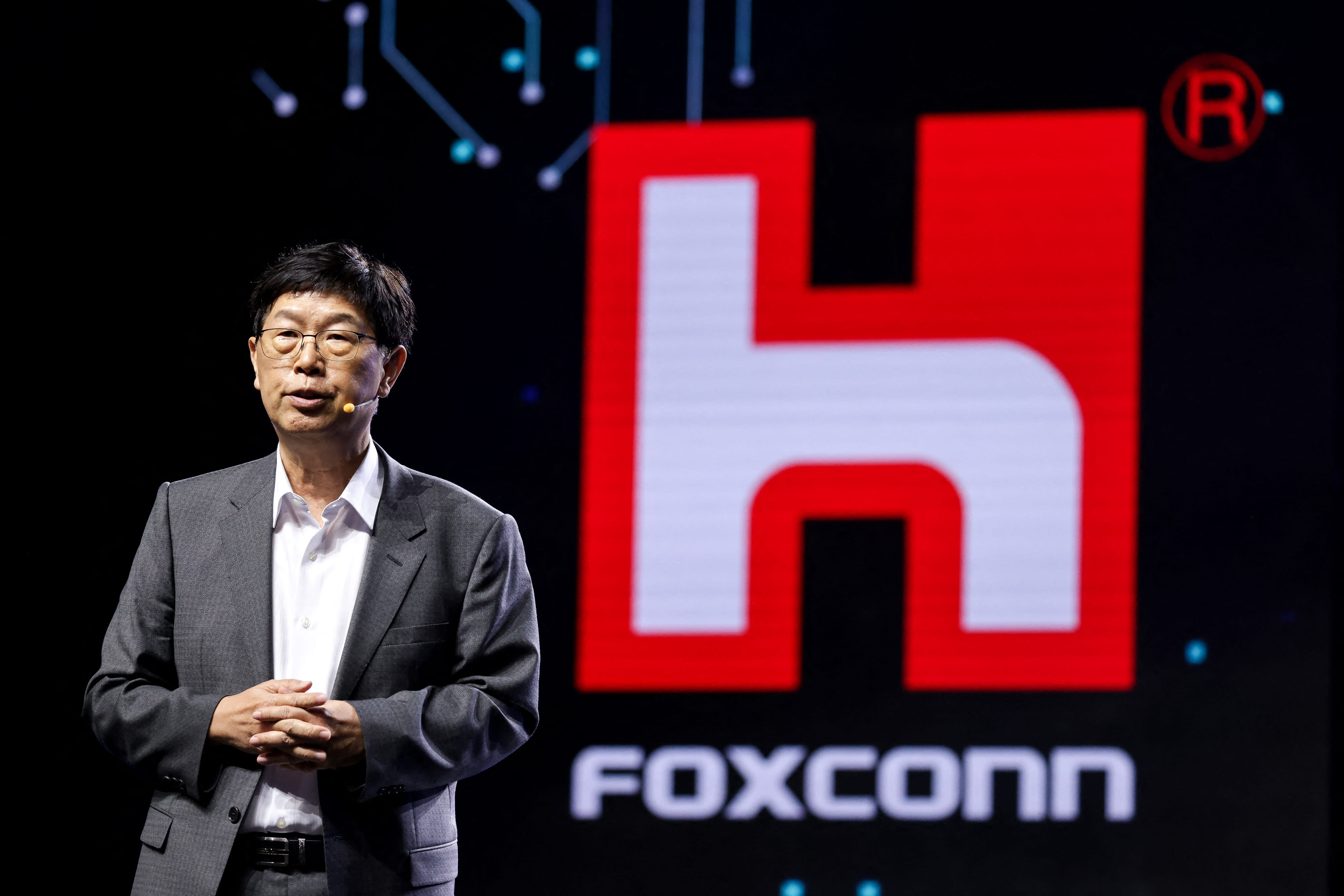 The chairman of Foxconn believes that the AI investment boom may not peak yet as language models continue to improve.