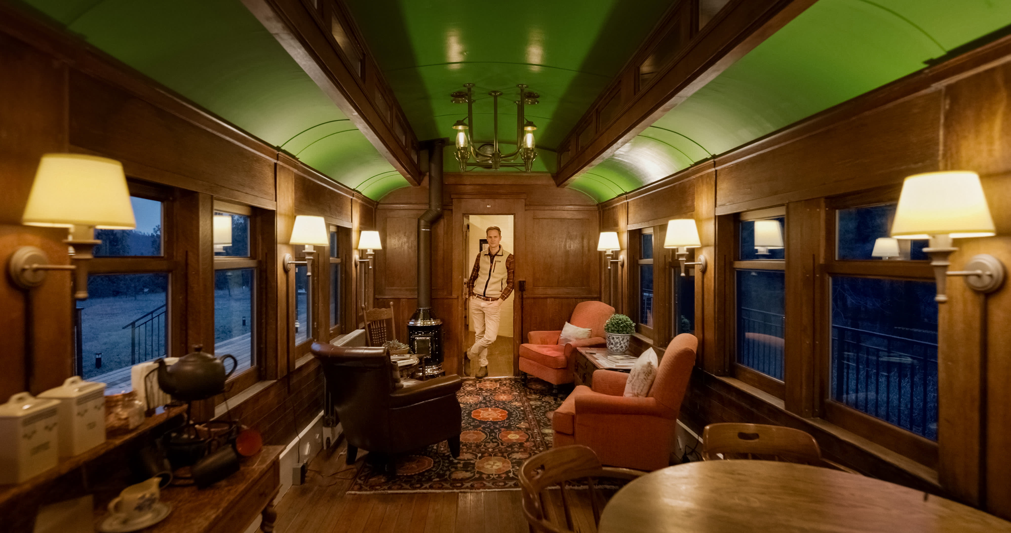 An Airbnb that generates over $90,000 annually was created by a family who purchased an abandoned 1909 train car for just $3,000. Explore its interior.