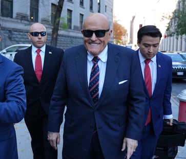 Giuliani denies allegation that he owes property in defamation case.