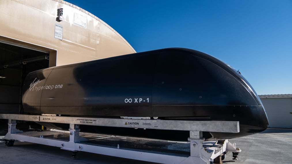 Millions of dollars and innovative technology are being brought to Appalachia's impoverished region by Richard Branson and John Chambers through the Hyperloop project.
