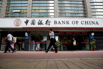 Analysts claim that China's stimulus plans are negatively impacting the profitability of its large banks.