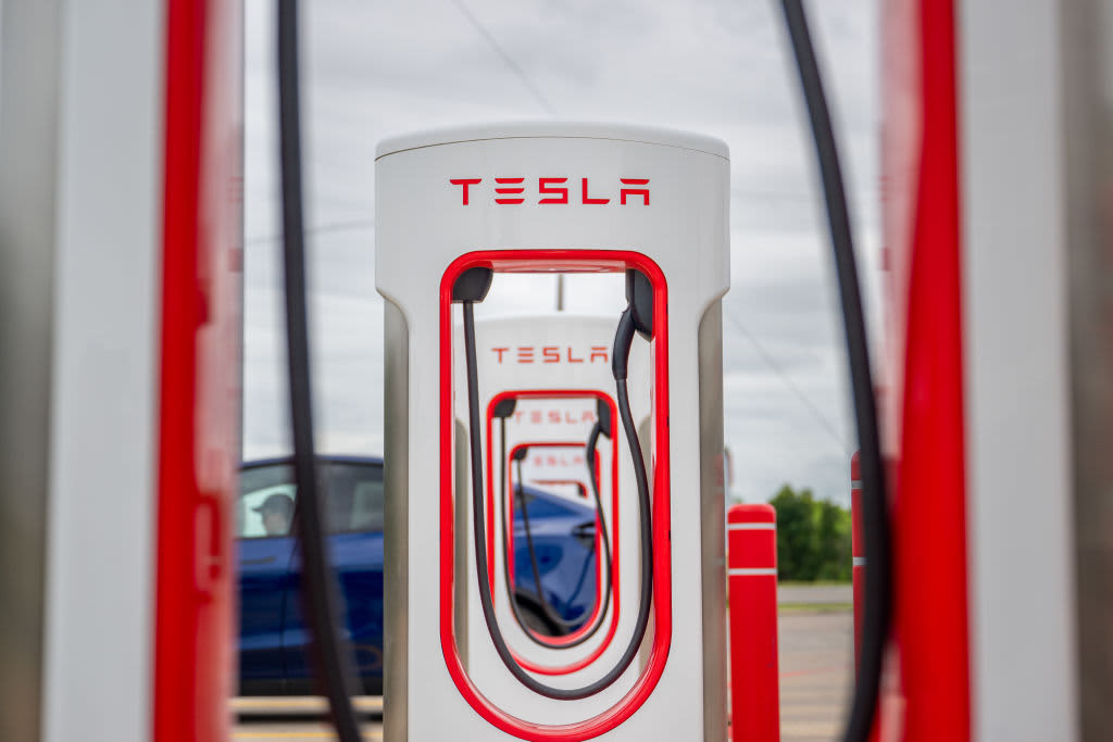 What will happen to Tesla's Supercharger network now that the team has been disbanded?