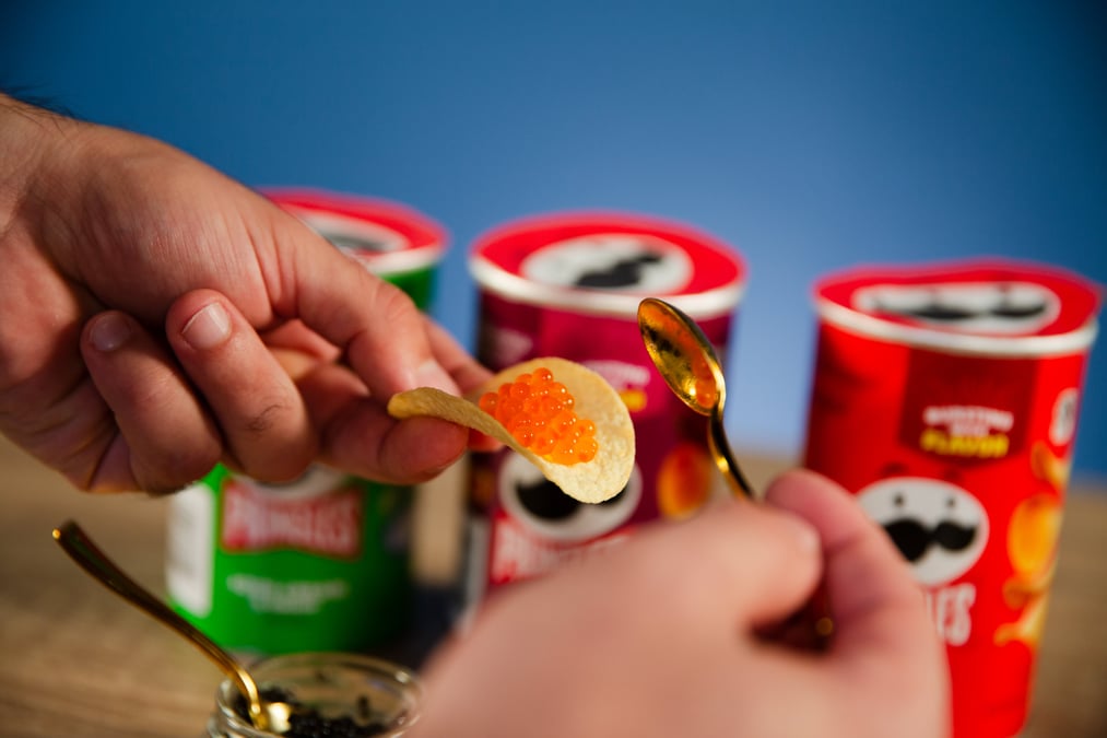 Food giants are quickly expanding their product lines to include unique and innovative items such as mustard-flavored Skittles and caviar-topped Pringles.