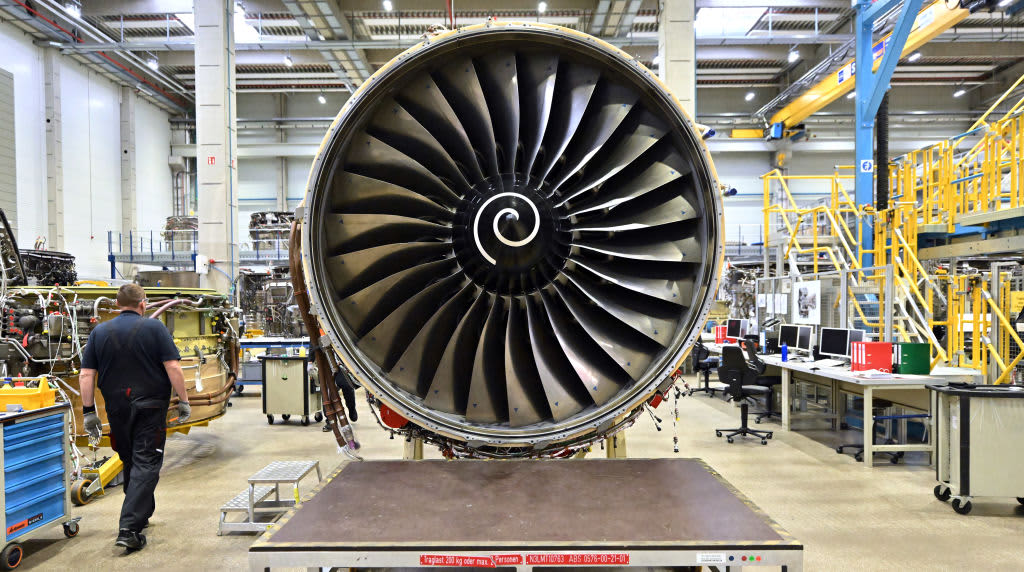 Rolls-Royce stock surges to a record high due to reinstated dividend and increased earnings forecast.