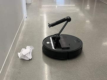 An AI-powered arm model is unveiled by a Chinese robot vacuum cleaner company.