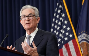According to a CNBC Fed Survey, there is a high chance of a soft landing when the Fed begins cutting rates midyear in 2024.