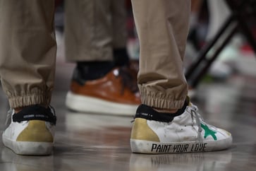 Golden Goose, a luxury sneaker brand, has delayed its initial public offering (IPO) due to political instability in Europe.