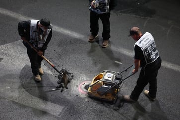 Carlos Sainz's car is damaged in the first practice session of the Las Vegas GP after a manhole cover falls onto the track.