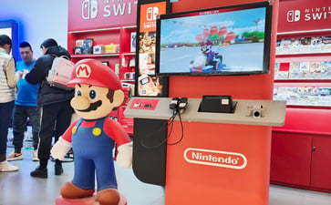 Nintendo's stock price increases by 6% after the company announces that future Switch games will be compatible with the console's successor.