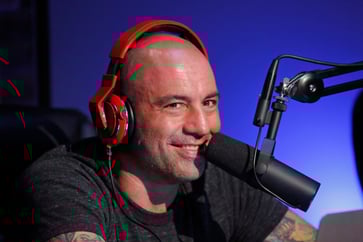 Podcaster Joe Rogan renews deal with Spotify, expands show to other platforms.