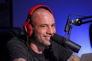 Podcaster Joe Rogan renews deal with Spotify, expands show to other platforms.