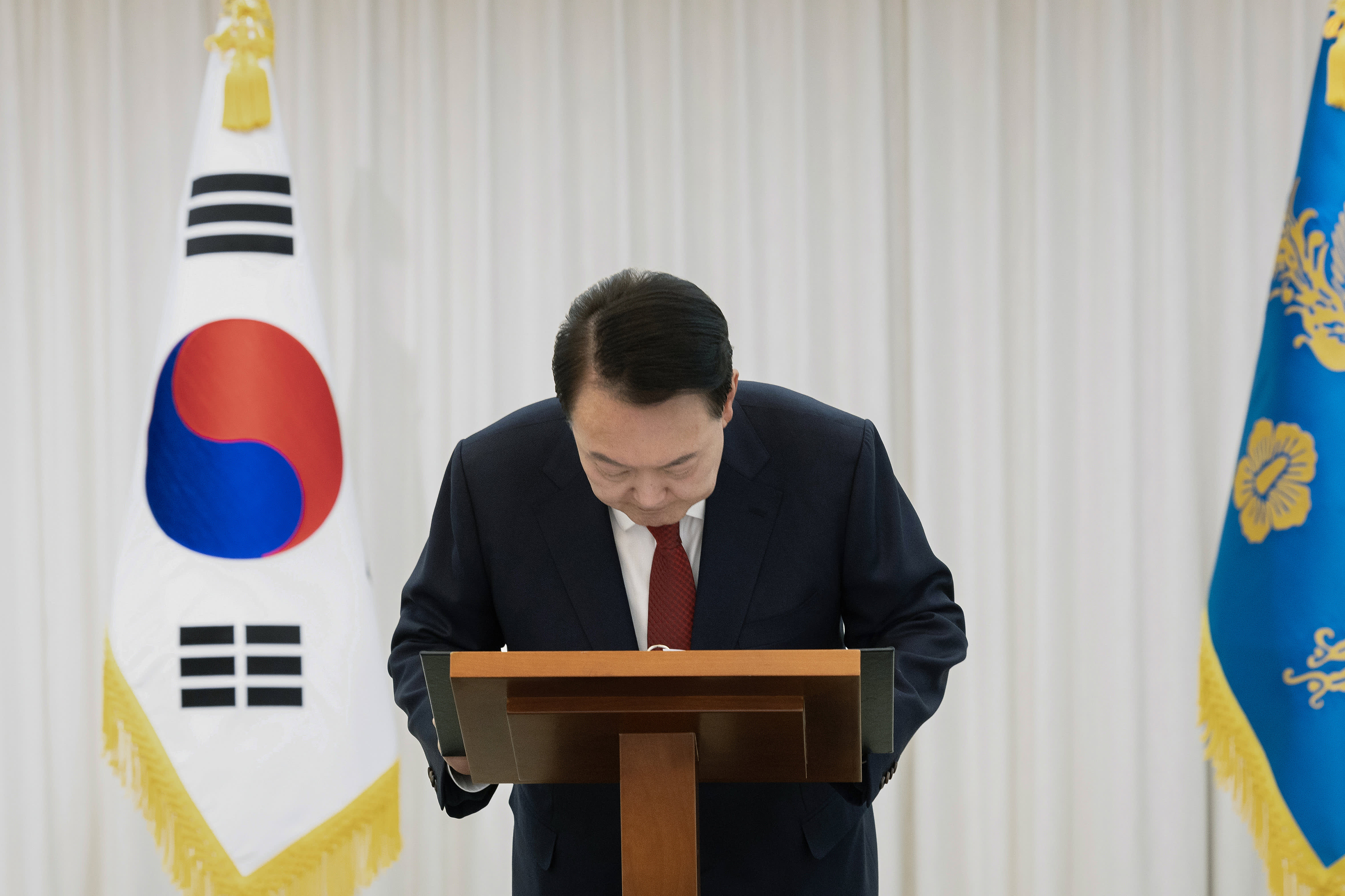 Yoon's impeachment deepens South Korea's political turmoil as court issues arrest warrant.