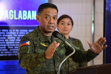 The Philippines should "react suitably" to China's "harassment" in the South China Sea, according to the country's military chief.