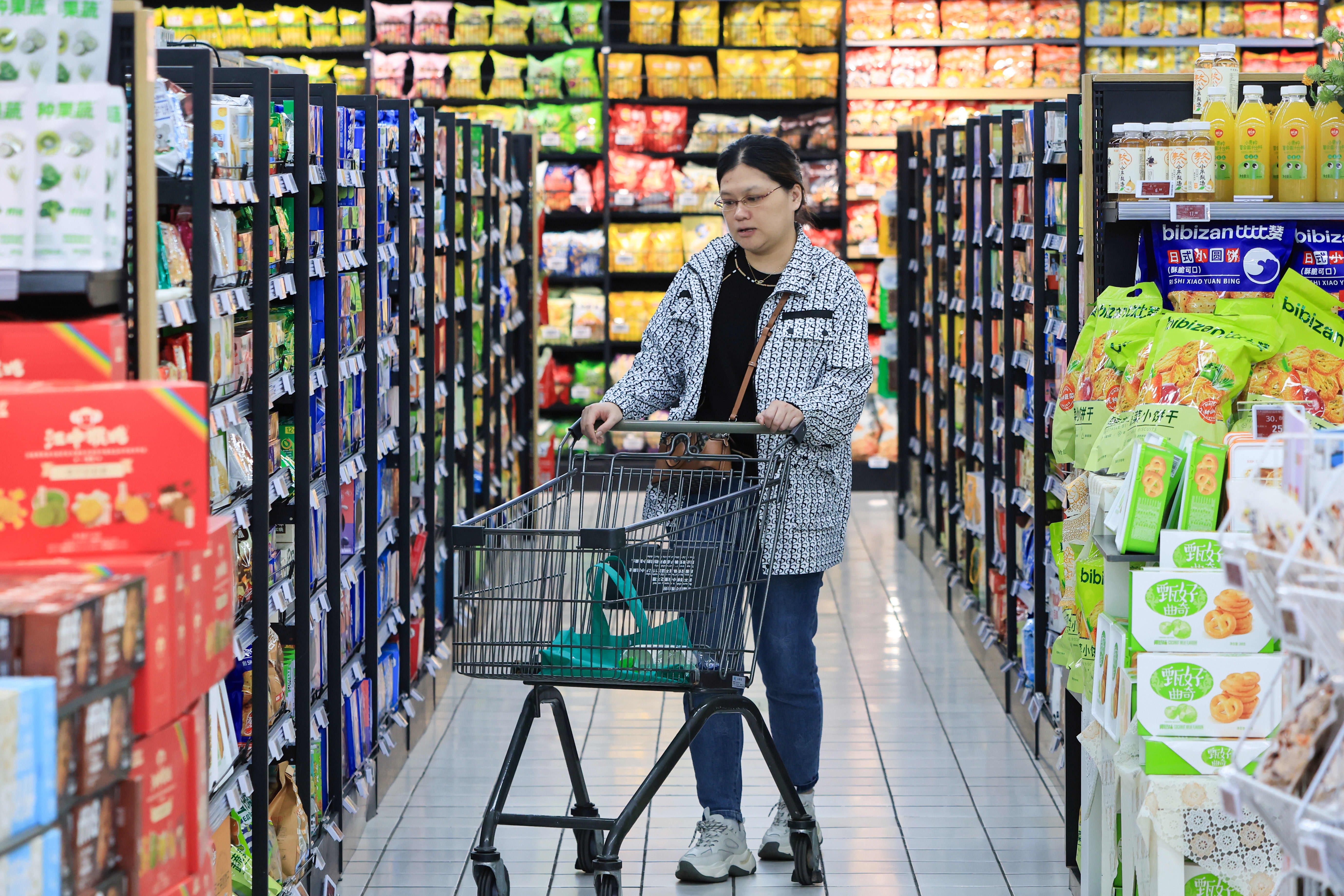 Despite trade war concerns, China's consumer prices rise less than anticipated due to slowing economy.