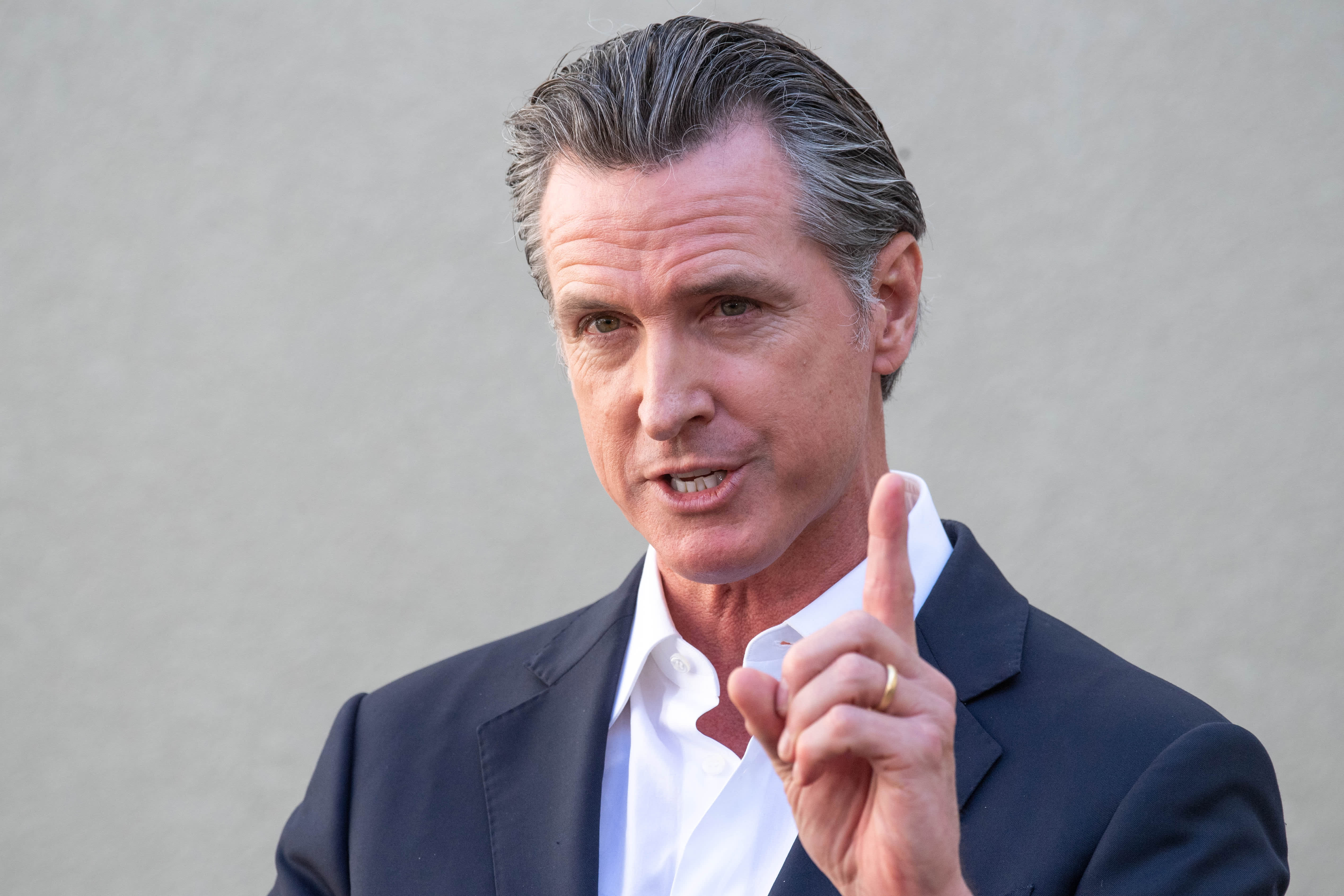 Gov. Newsom emphasizes California's efforts in combating climate change beyond mere words.