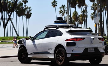 Waymo, Alphabet's self-driving unit, raises $5.6 billion in funding as the race for robotaxis intensifies in the US.