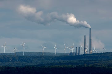 The wind energy industry is optimistic that it will soon recover from billions in losses, with companies such as GE and Siemens leading the way.