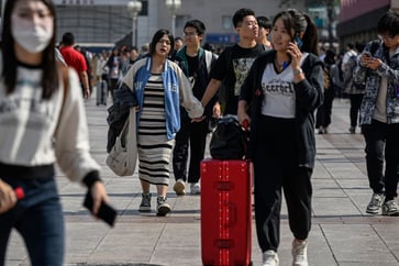 The economic struggles of China dampen the holiday travel during the 'Golden Week'.