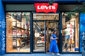 Despite the denim craze, Levi's shares decline 12% due to disappointing sales.