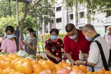 Singapore aims to make "determined actions" to loosen limitations following the omicron surge peak.