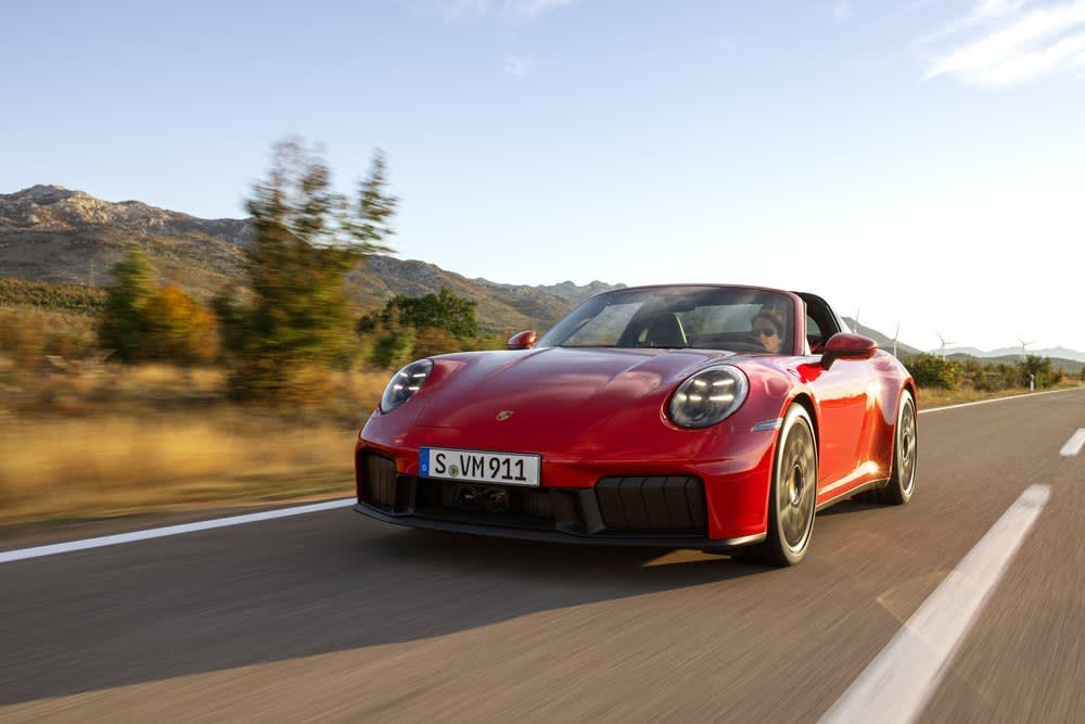 Porsche unveils its first hybrid sports car, priced at $164,900.