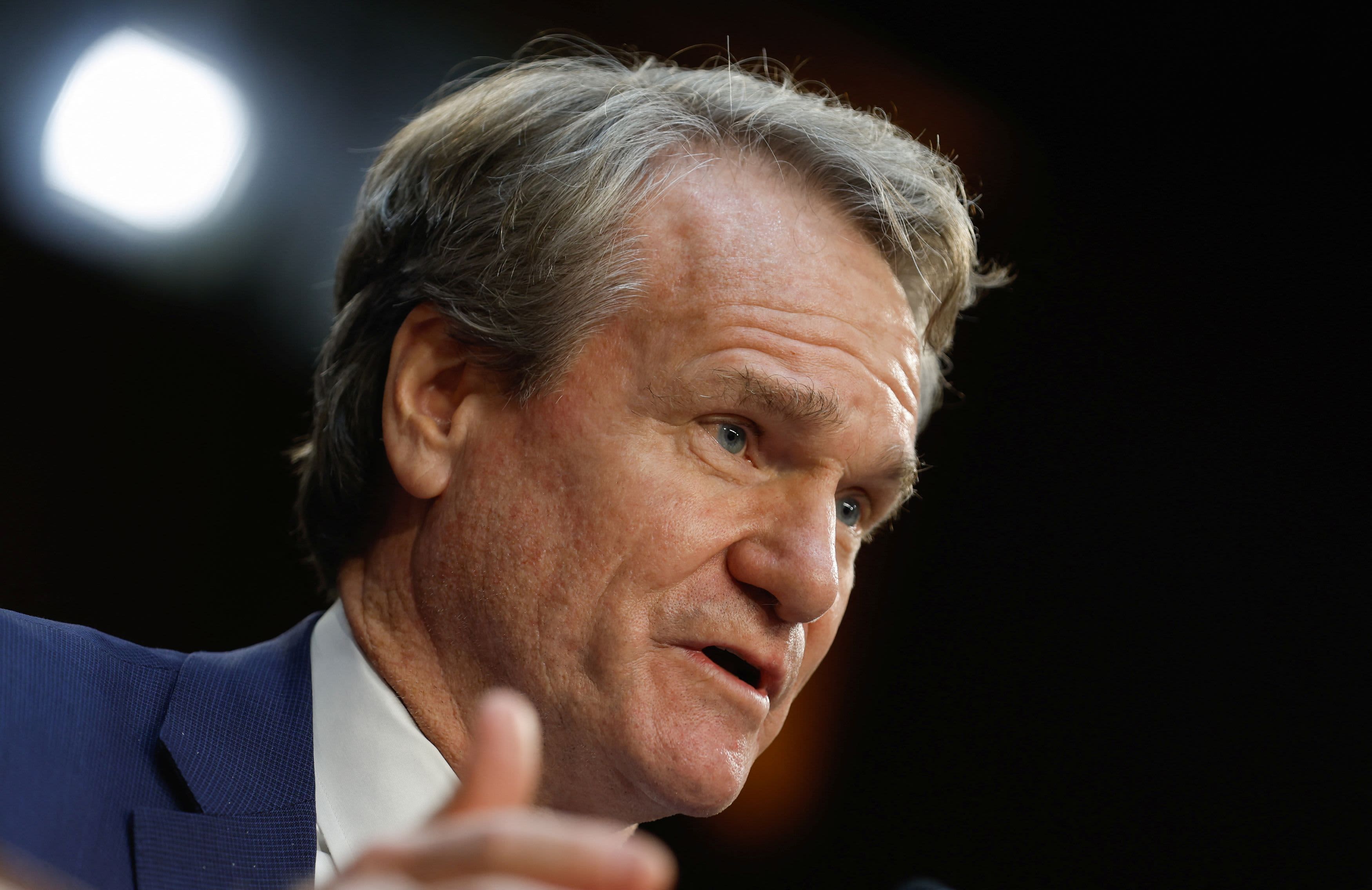 Bank of America CEO states that U.S. consumers and businesses have become more cautious with their spending.