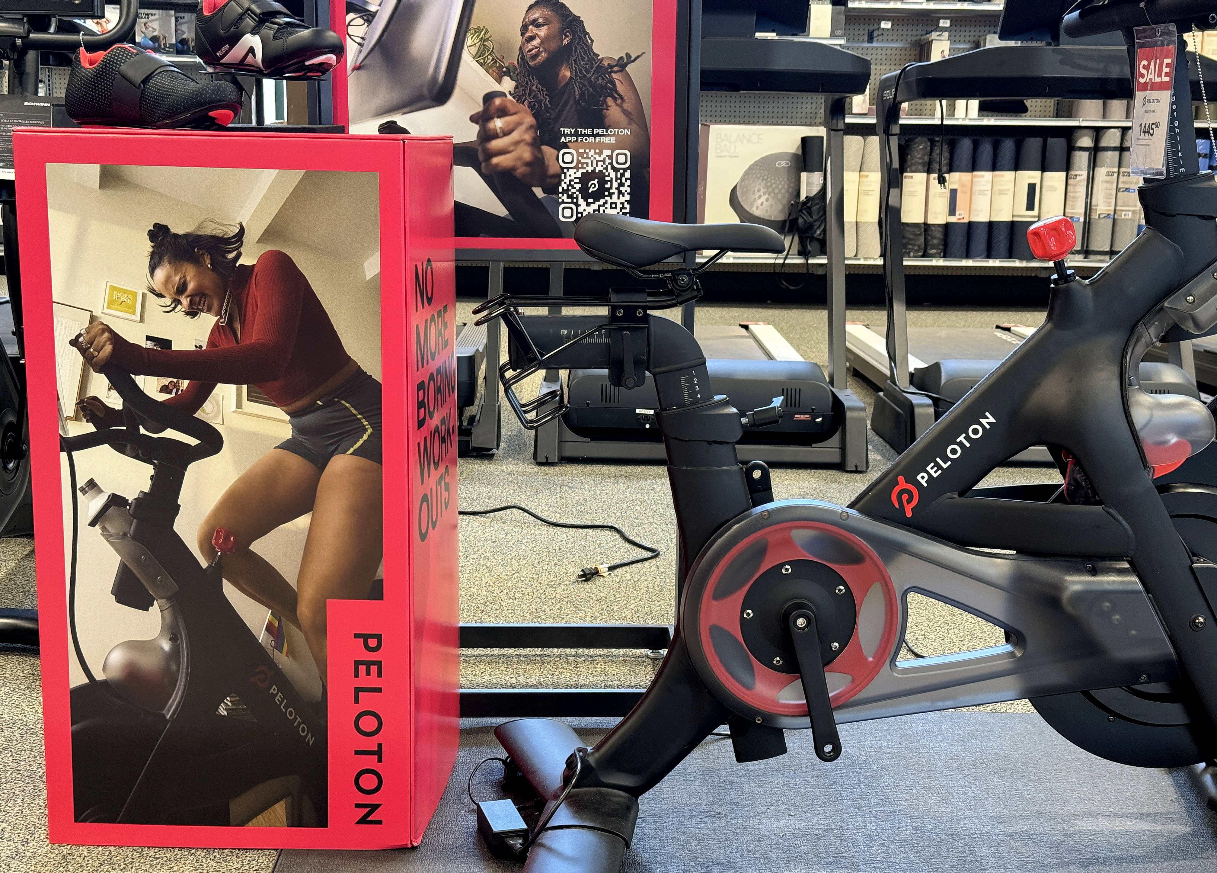 Peloton adjusts its full-year profit forecast, anticipating a weaker holiday quarter than previously predicted.