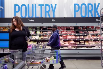 Walmart is being negatively impacted by the Fed's efforts to control inflation, according to Cramer.