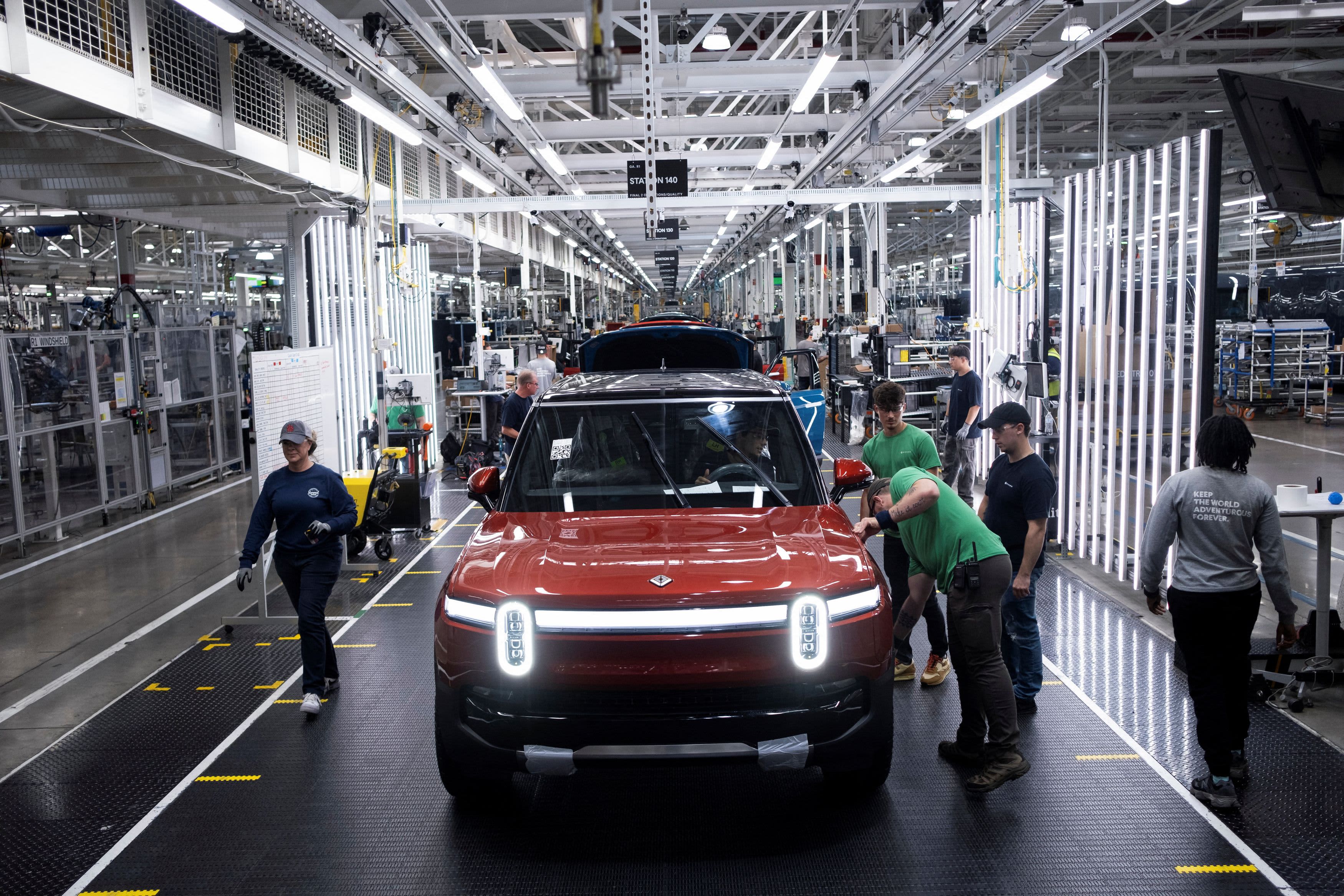 Rivian's stock falls after the company cuts production forecast and fails to meet Q3 delivery expectations.