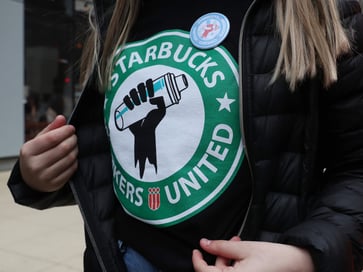 Starbucks CEO Brian Niccol pledges to collaborate with union during negotiations.