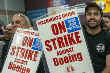 Boeing CFO warns that a strike could endanger the company's recovery and negatively impact aircraft production.