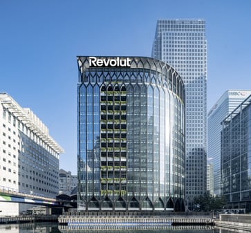 Revolut relocates its global headquarters to the financial district of London while it waits for a UK bank license.