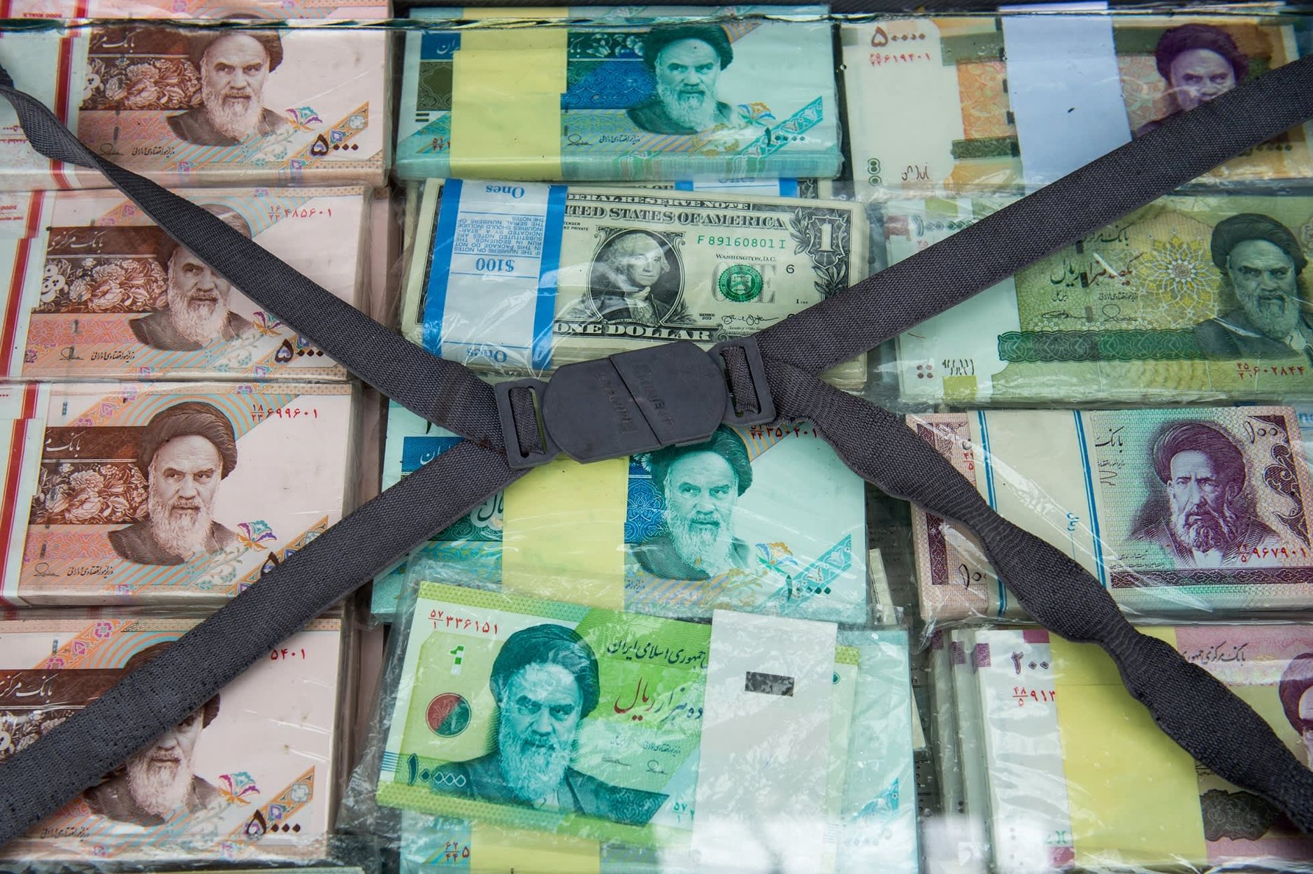 Iran grapples with two challenges: currency depreciation and the loss of a key regional ally.