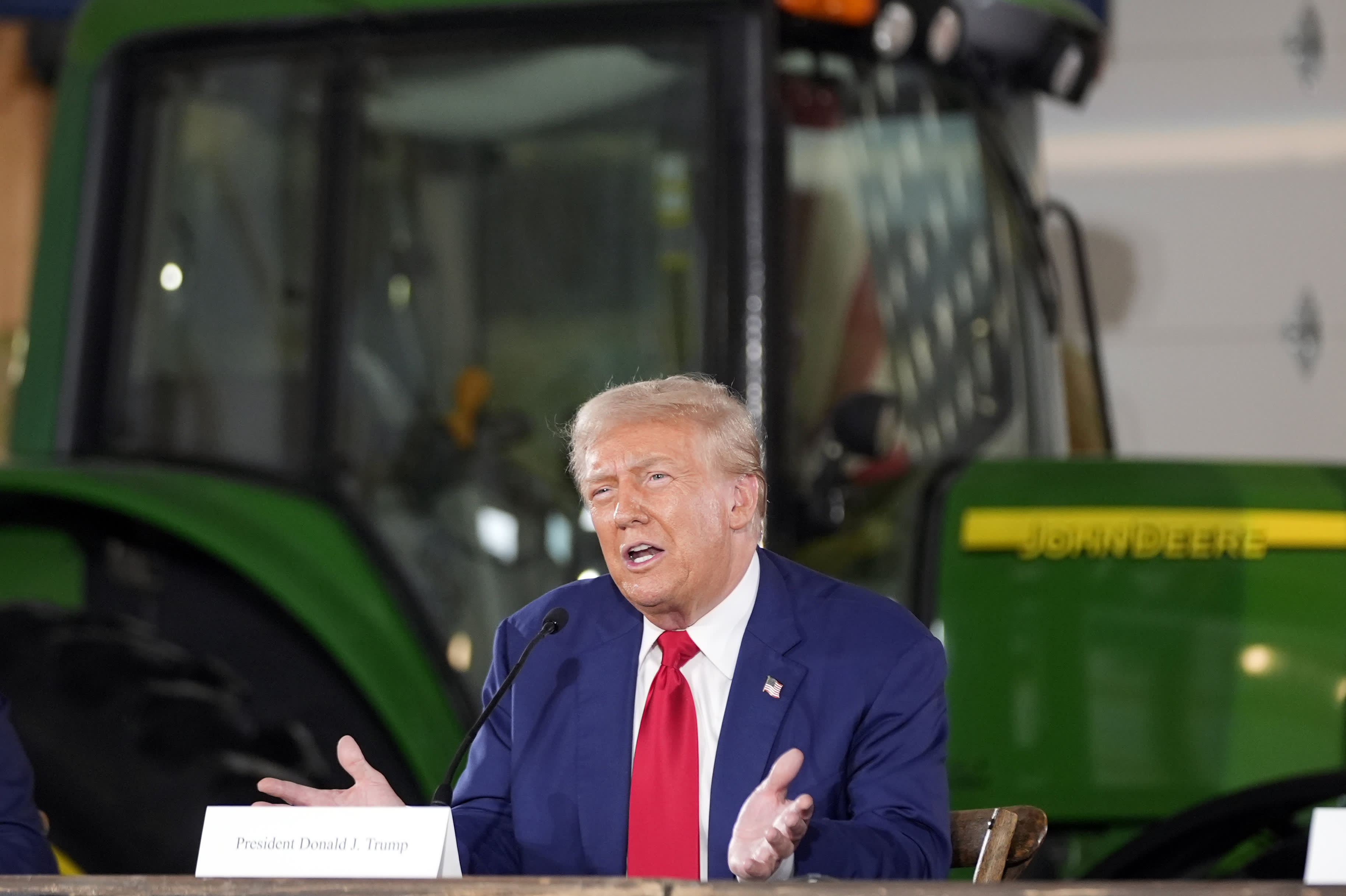 If John Deere moves production to Mexico, Trump threatens a 200% tariff.