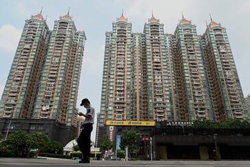 Major cities in China ease homebuying restrictions, prompting a rally in property stocks.