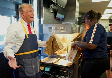 McDonald's clarifies its political stance following Trump visit to its restaurant.