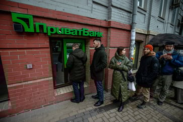 The Russian economy is severely impacted by economic sanctions, causing the ruble to plummet and interest rates to rise.