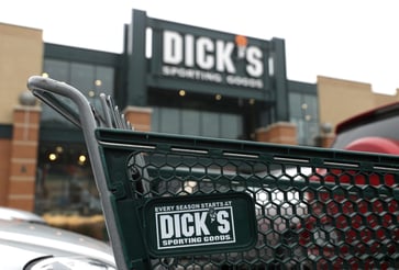 Dick's Sporting Goods adjusts its sales forecast, citing increased spending on athletic footwear and gear.