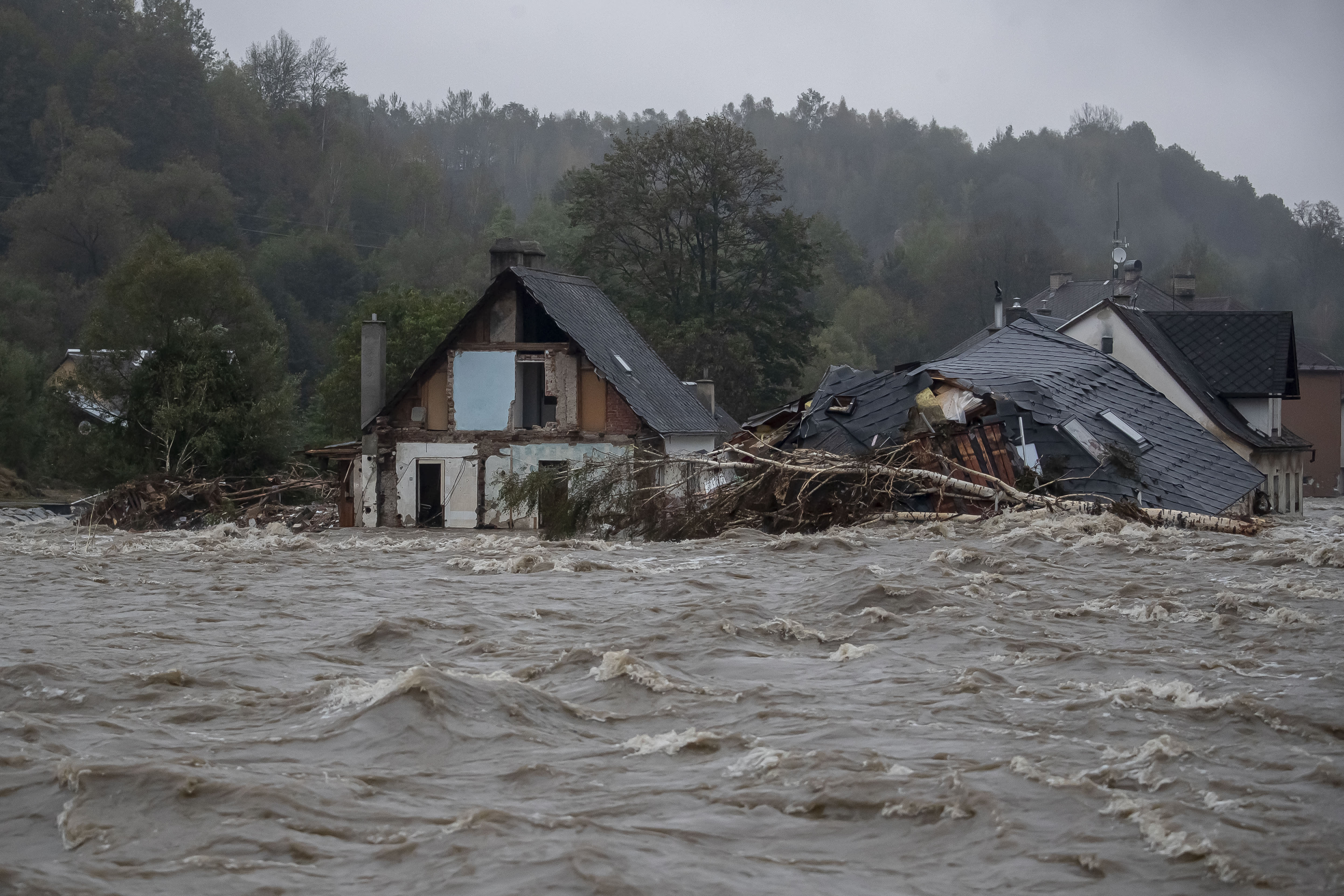 Floods in Central and Eastern Europe cause rising death toll.
