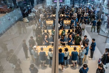 Beijing residents who are fans of Apple iPhones are increasingly choosing Huawei's trifold phone.