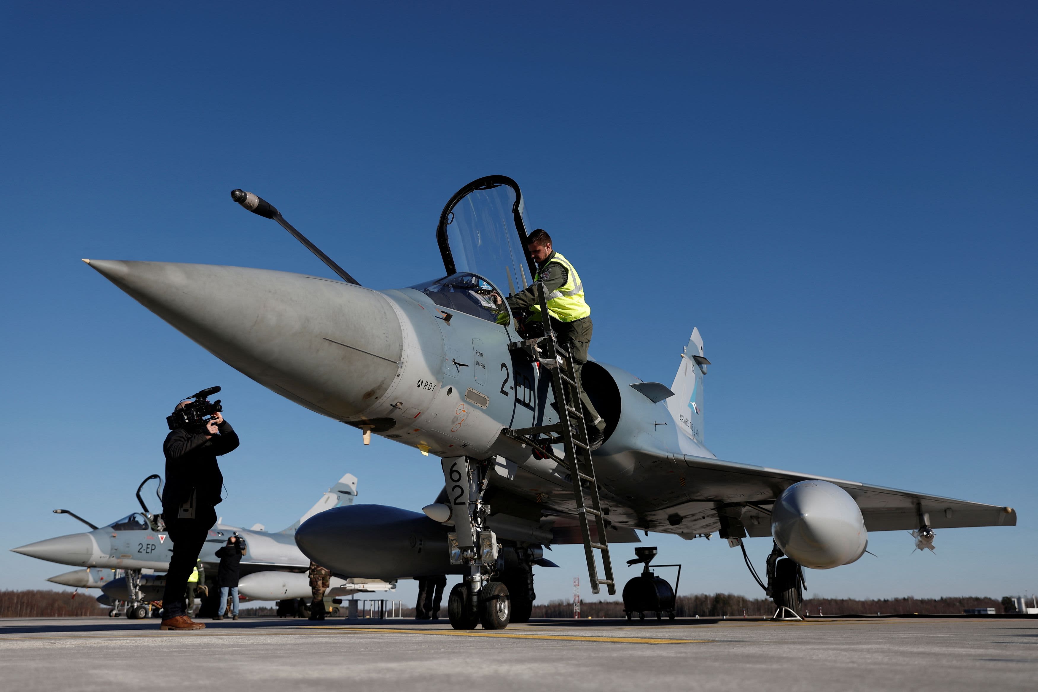 A potential NATO defense spending surge may result from Russia's invasion of Ukraine.