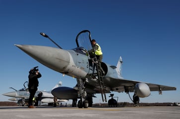 A potential NATO defense spending surge may result from Russia's invasion of Ukraine.