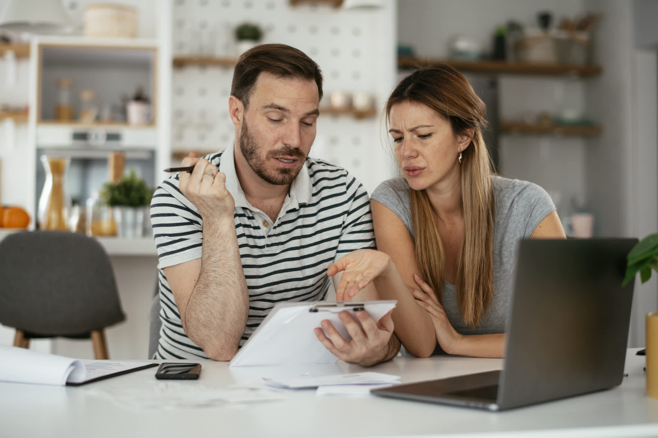 The self-made millionaire's advice to a couple struggling with $65,000 in credit card debt is that it's not just about paying off the debt, but also about changing their spending habits.