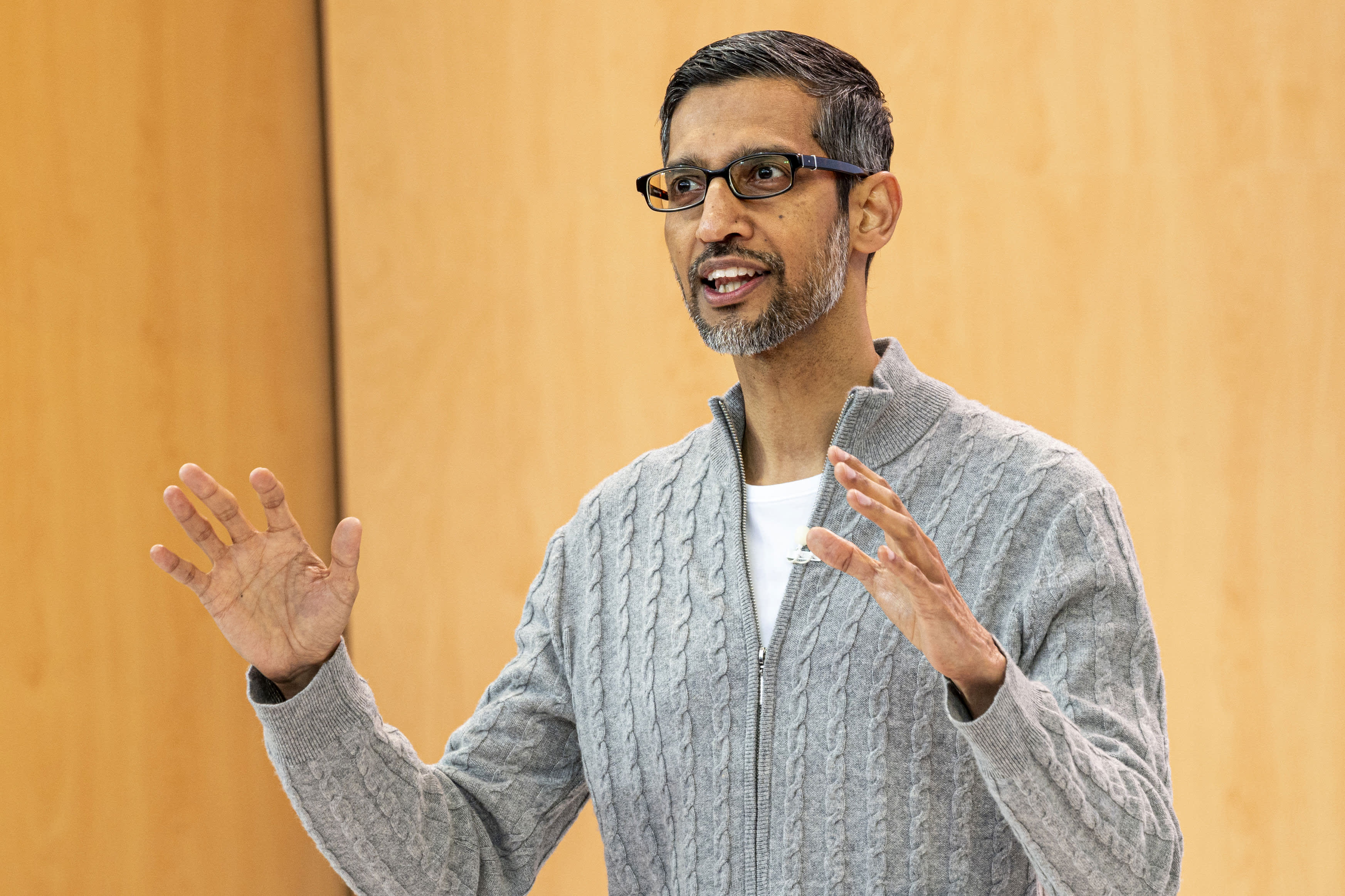 Google staff push for more information on cost-cutting measures during company-wide meeting.