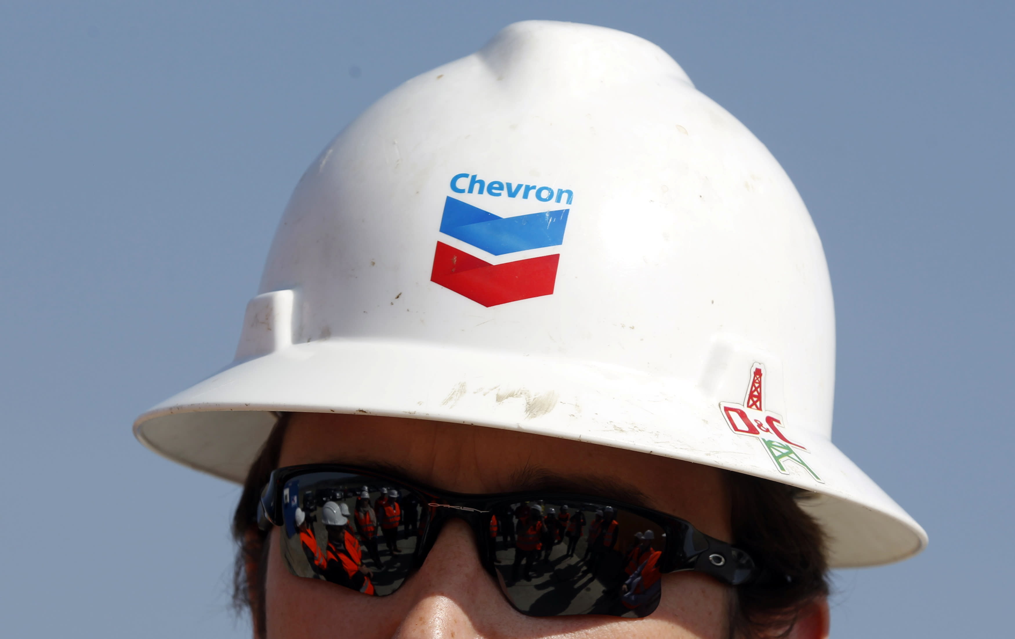 Chevron experiences a decline in share price following a disappointing fourth-quarter profit.