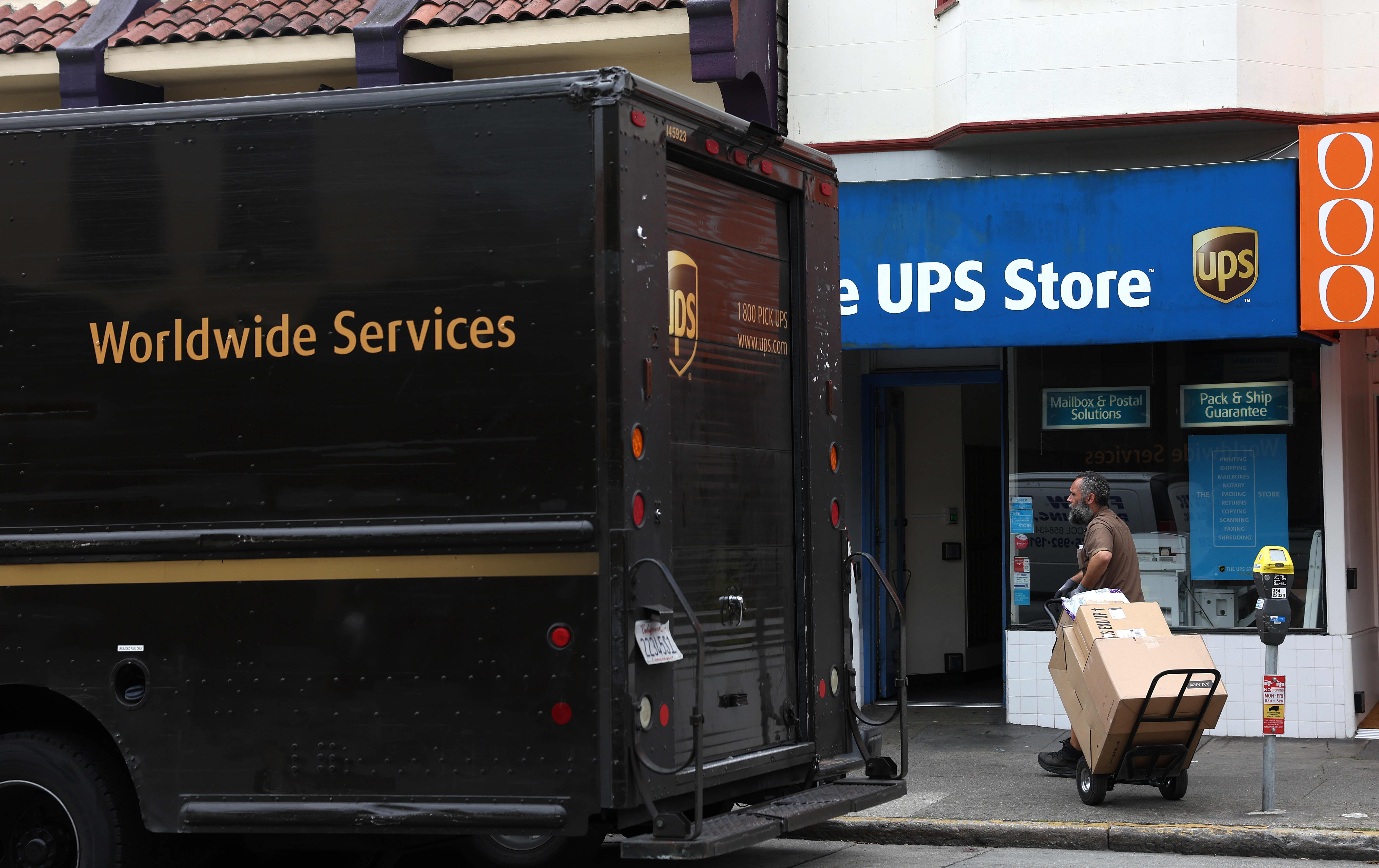 UPS stock declines following revenue forecast reduction.