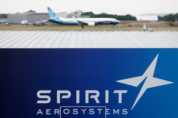 Spirit AeroSystems, a Boeing supplier, announces job cuts due to decreased airplane delivery rates.