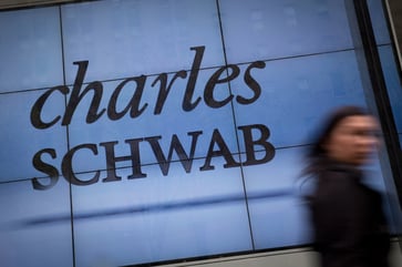 Four financial GARP stocks are recommended for investment by CNBC's Jim Cramer.