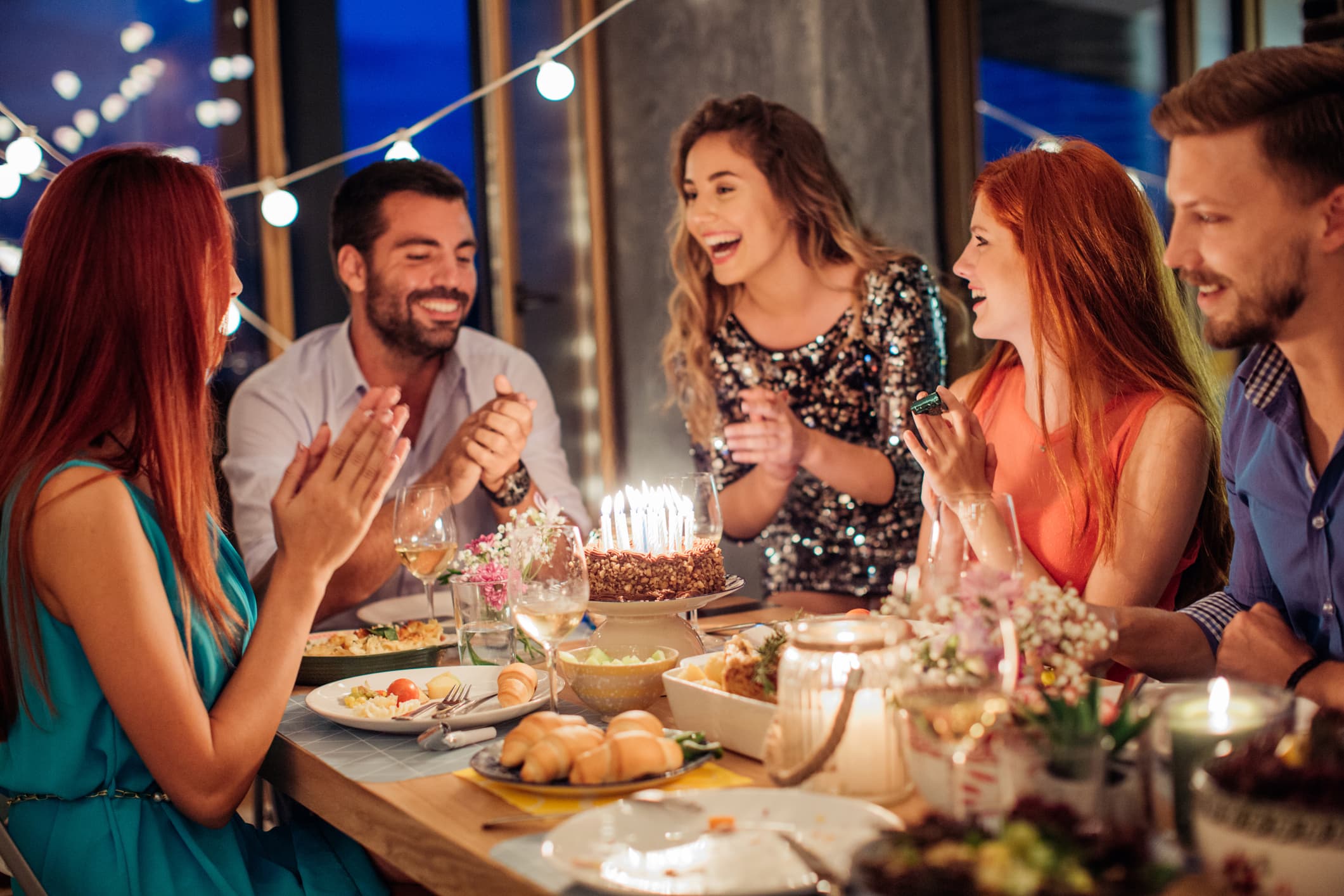 How to host a birthday dinner without breaking the bank or appearing cheap, according to etiquette experts.