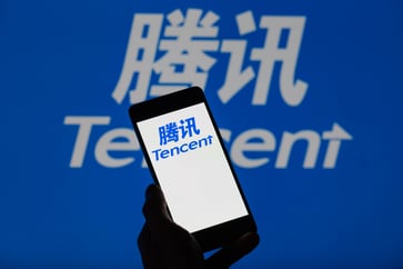 Tencent's shares drop more than 5% in Hong Kong following U.S. classification as a military company.